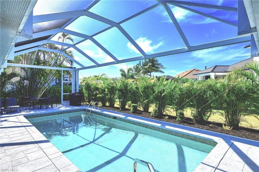 This 3/2 southern exposure pool home (slider access from all - Beach Home for sale in Marco Island, Florida on Beachhouse.com