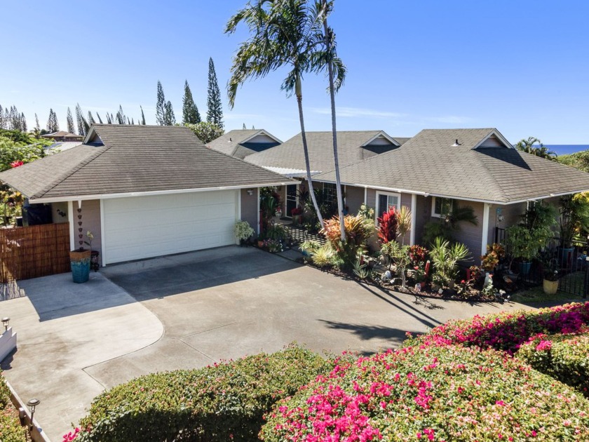 This exquisite single-level home is nestled within the - Beach Home for sale in Kailua Kona, Hawaii on Beachhouse.com