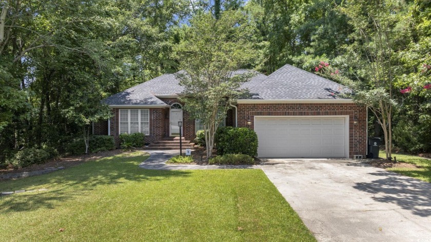 Welcome to this stunning 4-bedroom, 2-bathroom all-brick home in - Beach Home for sale in Little River, South Carolina on Beachhouse.com