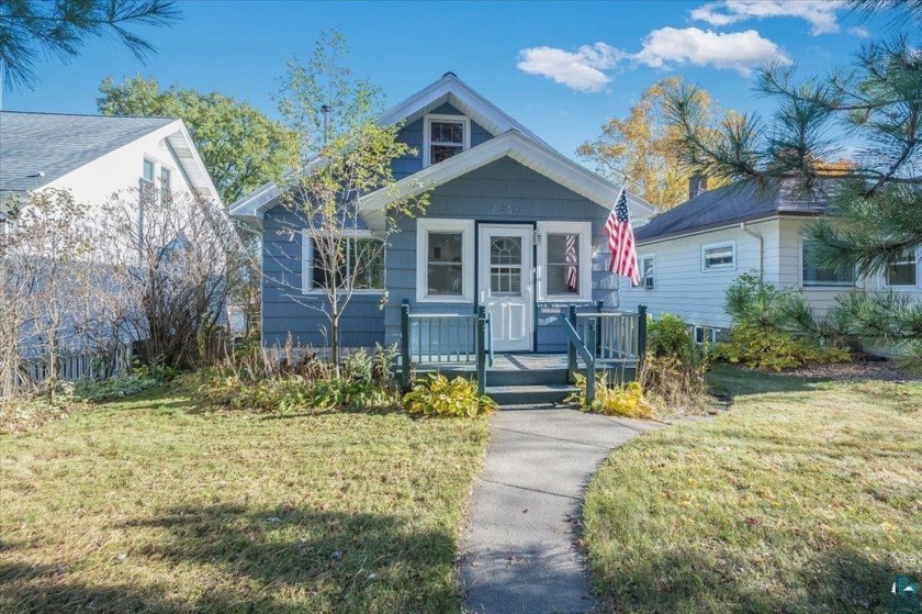 Discover this gem of a home nestled on a quiet tree lined street - Beach Home for sale in Duluth, Minnesota on Beachhouse.com