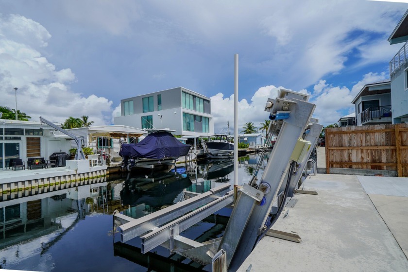Waterfront Paradise with Dock & Boat Lift - Financing - Beach Home for sale in Key Largo, Florida on Beachhouse.com
