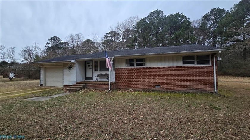 Inviting brick rancher set on a beautifully maintained 1-acre - Beach Home for sale in Cobbs Creek, Virginia on Beachhouse.com