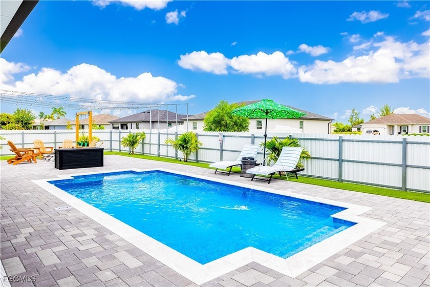 Welcome to this modern 2023 built home located in the desirable - Beach Home for sale in Cape Coral, Florida on Beachhouse.com