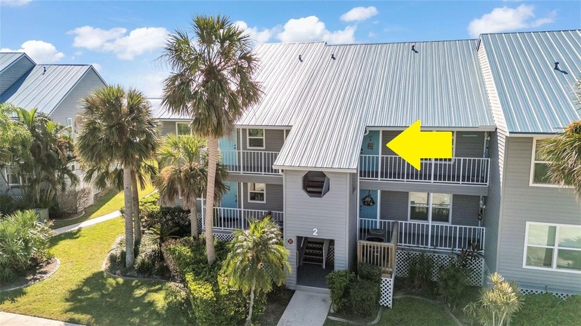 Experience serene waterfront living in this inviting TURNKEY - Beach Condo for sale in Port Charlotte, Florida on Beachhouse.com