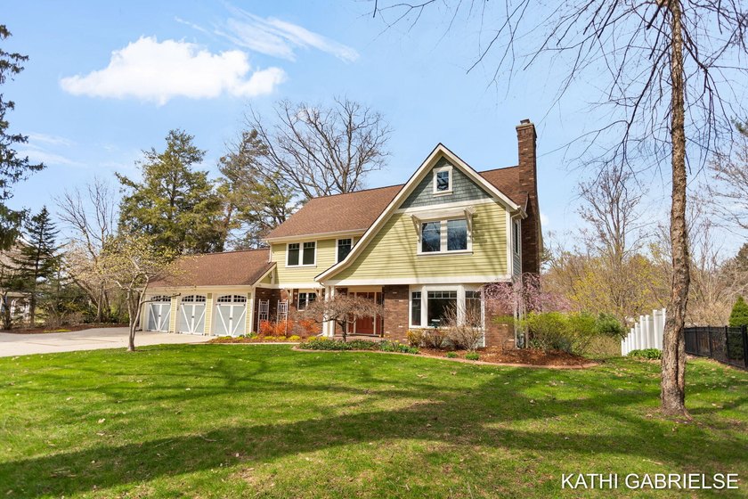 Spring Lake waterfront home is nestled on a private one-acre - Beach Home for sale in Spring Lake, Michigan on Beachhouse.com