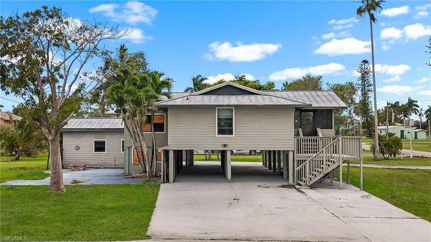 The main residence, elevated on stilts, offers 3 bedrooms and 2 - Beach Home for sale in Everglades City, Florida on Beachhouse.com