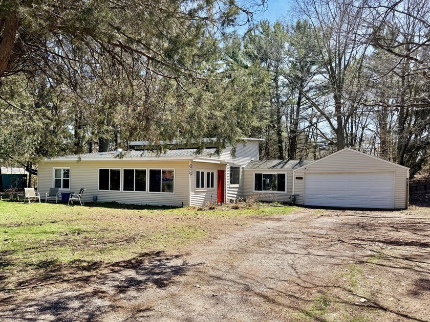 Location truly says it all with this Grand Haven Home! Enjoy - Beach Home for sale in Grand Haven, Michigan on Beachhouse.com