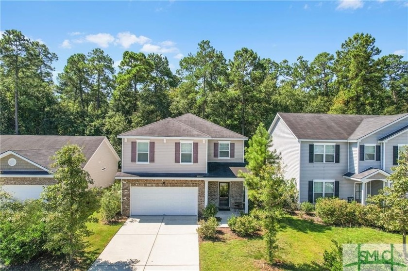 This Charming two-story home is located within the Spring Lake - Beach Home for sale in Savannah, Georgia on Beachhouse.com