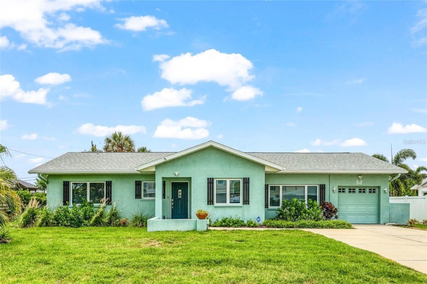 Don't miss this charming 3 bedroom, 2 1/2 bath home located on - Beach Home for sale in Holmes Beach, Florida on Beachhouse.com