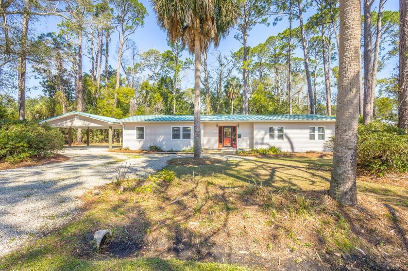 This 4 bedroom, 2 bathroom ranch styled home nestled on 3 lots - Beach Home for sale in Apalachicola, Florida on Beachhouse.com