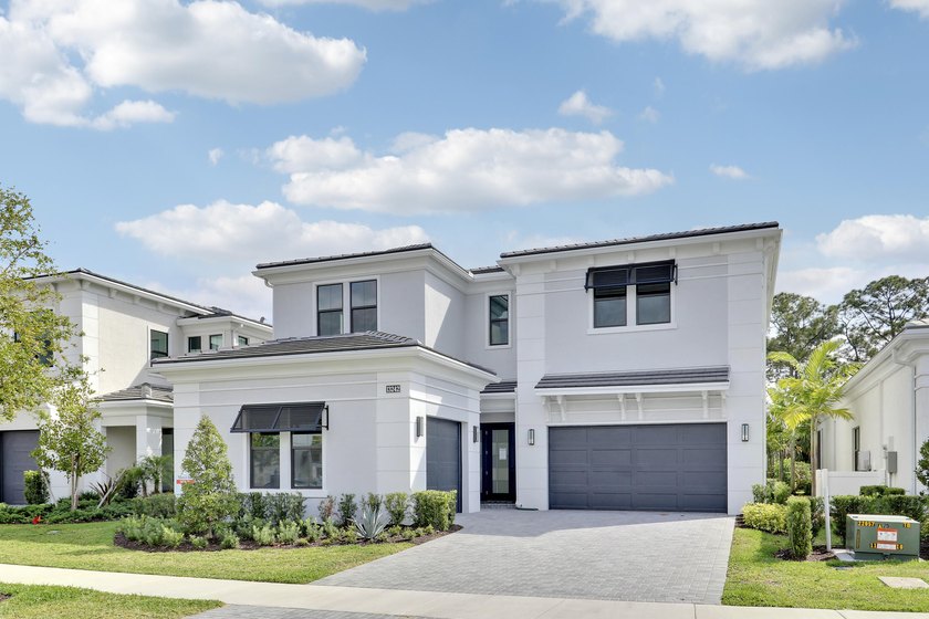 Experience luxury living in this exceptional Mondrian model in - Beach Home for sale in Palm Beach Gardens, Florida on Beachhouse.com