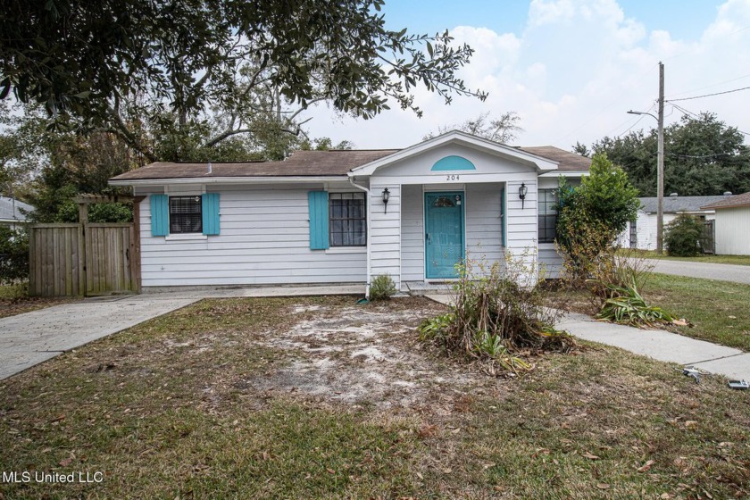 Coastal charm meets investment potential just two blocks from - Beach Home for sale in Long Beach, Mississippi on Beachhouse.com