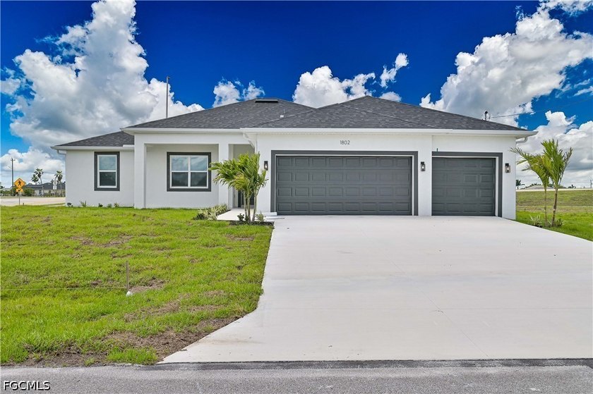 Welcome to this **brand-new construction home offering 1,961 sq - Beach Home for sale in Cape Coral, Florida on Beachhouse.com