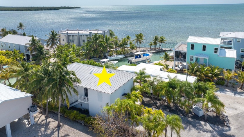 Stunning! Custom designed and built, elevated CBS home on a - Beach Home for sale in Geiger Key, Florida on Beachhouse.com