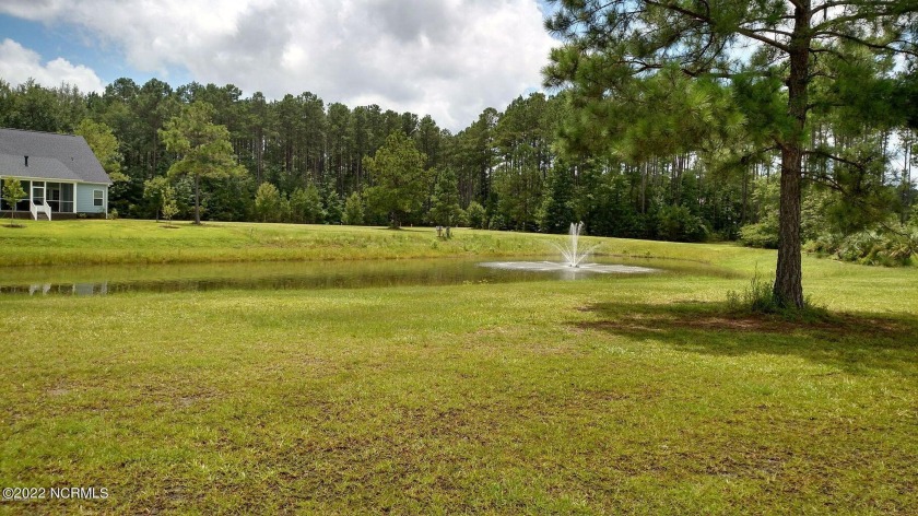 Gorgeous and completely cleared lot with pond view, including a - Beach Lot for sale in Calabash, North Carolina on Beachhouse.com