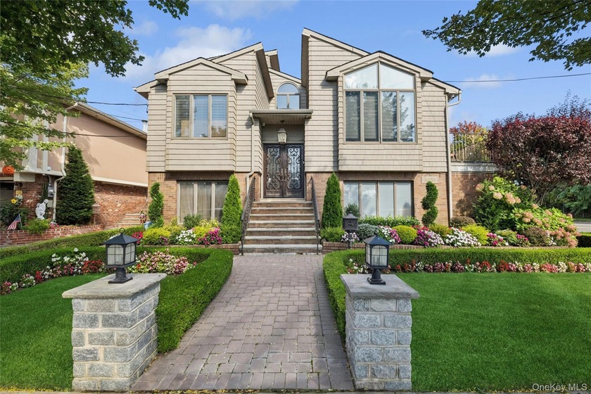 Welcome to 164-53 85th Street - a spectacular six-bedroom, three - Beach Home for sale in Howard Beach, New York on Beachhouse.com