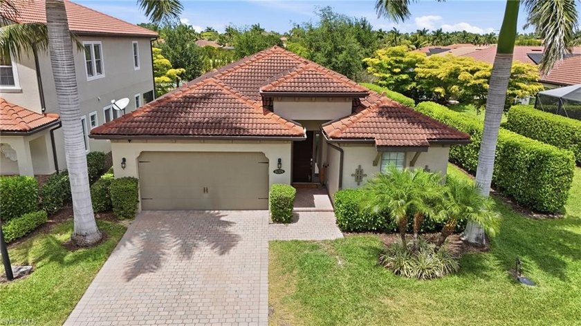 Tucked away in the quiet community of Barrington Cove, this - Beach Home for sale in Naples, Florida on Beachhouse.com