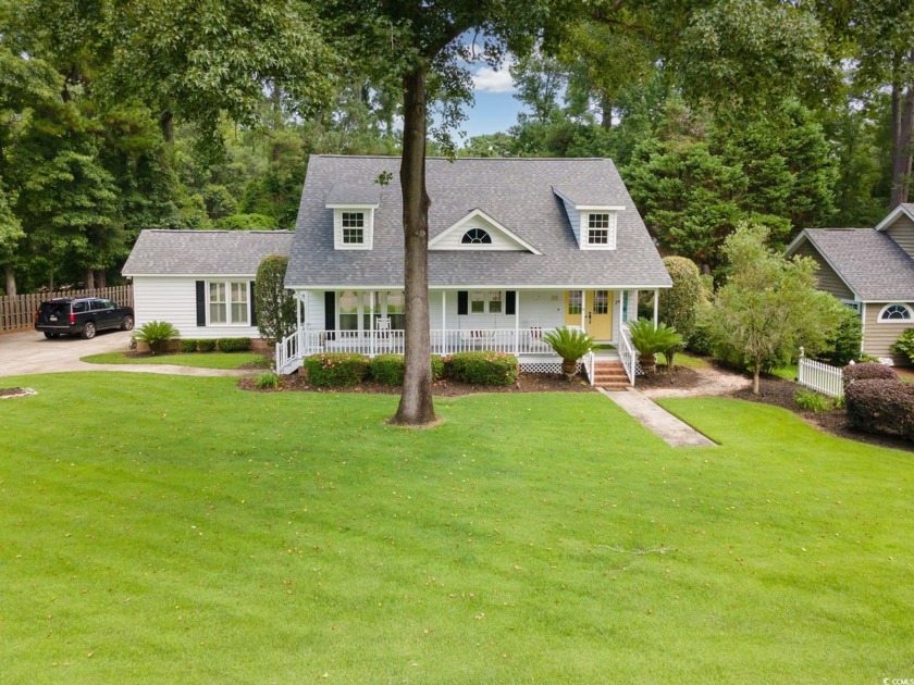 Motivated Sellers! This home features a large lot with a lush - Beach Home for sale in Pawleys Island, South Carolina on Beachhouse.com