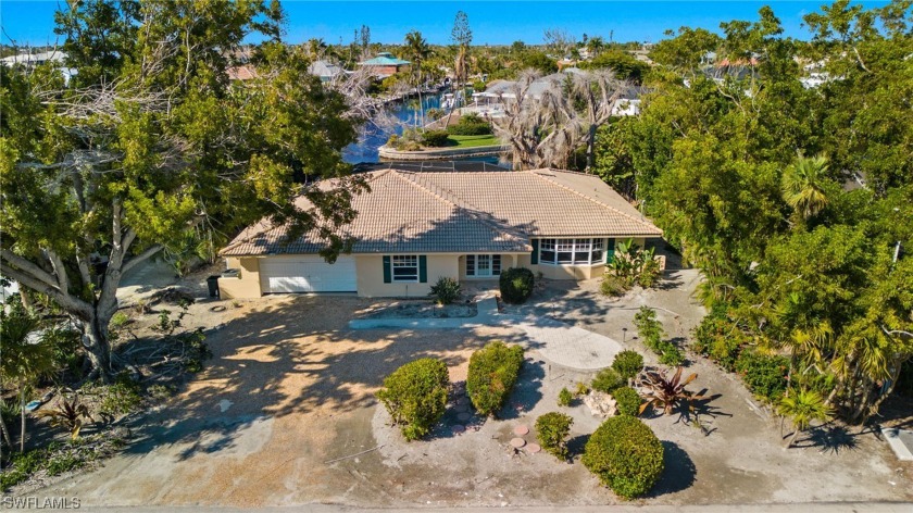 Nestled on one of Shell Harbor's most coveted streets, 828 Sand - Beach Home for sale in Sanibel, Florida on Beachhouse.com