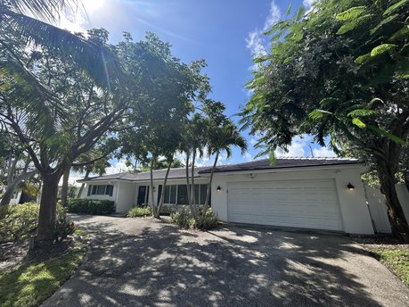 New 50-year tile roof.  5-star renovations, open floor plan - Beach Home for sale in Singer Island, Florida on Beachhouse.com