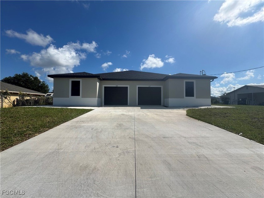 Brand New Construction Duplex - Modern Design & Prime Location! - Beach Home for sale in Lehigh Acres, Florida on Beachhouse.com