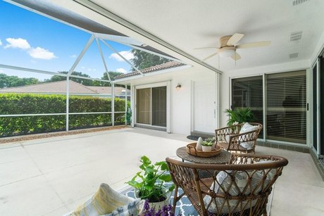 This charming 2-bedroom, 2-bath home features a beautifully - Beach Townhome/Townhouse for sale in Palm Beach Gardens, Florida on Beachhouse.com