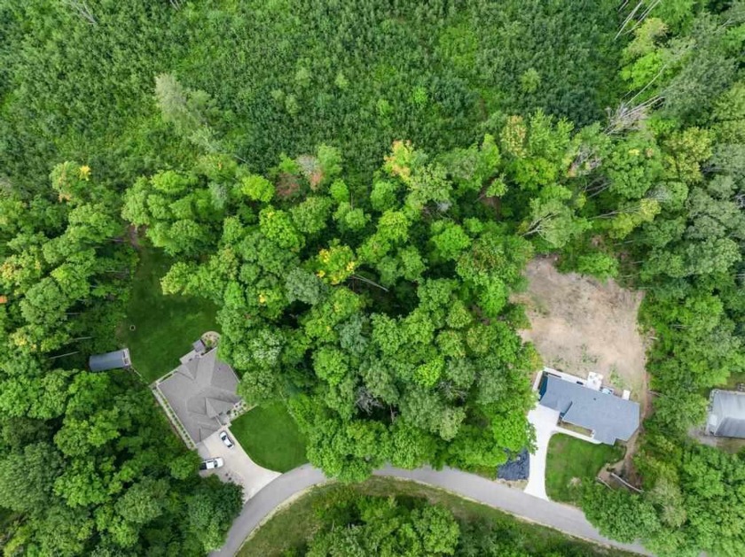 Nestled within the picturesque Little Traverse Township in - Beach Lot for sale in Harbor Springs, Michigan on Beachhouse.com