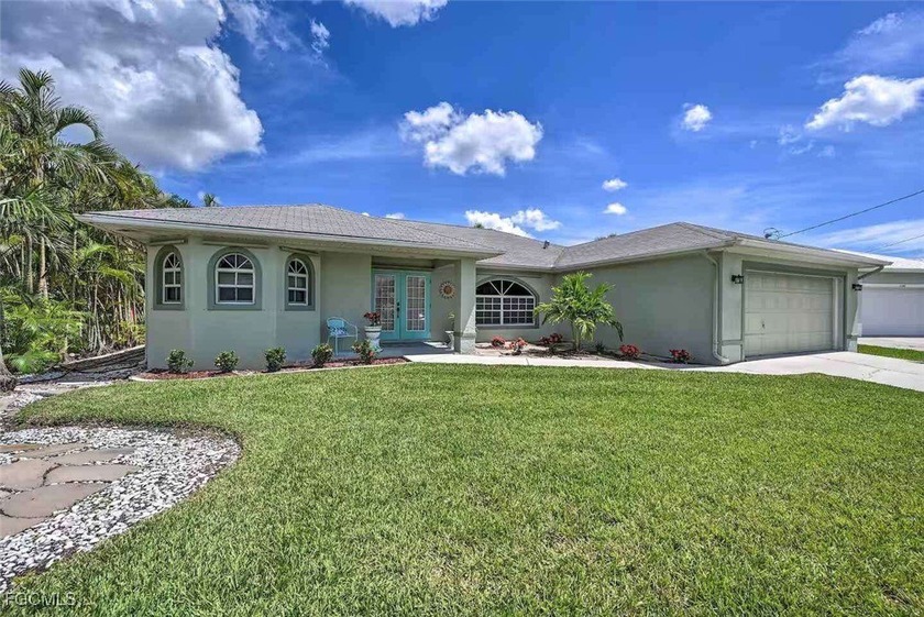 Beautiful waterfront home that sits on a cozy lake off a - Beach Home for sale in Cape Coral, Florida on Beachhouse.com