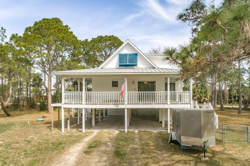Spacious bayview home on St. George Island! Situated in the - Beach Home for sale in St. George Island, Florida on Beachhouse.com