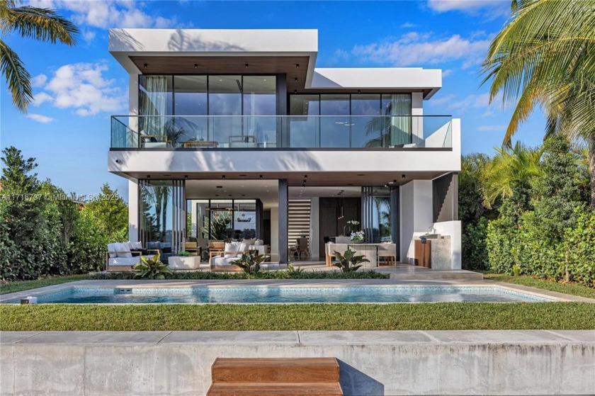 Overlooking Biscayne Bay with magnificent sunsets, this brand - Beach Home for sale in Miami Beach, Florida on Beachhouse.com