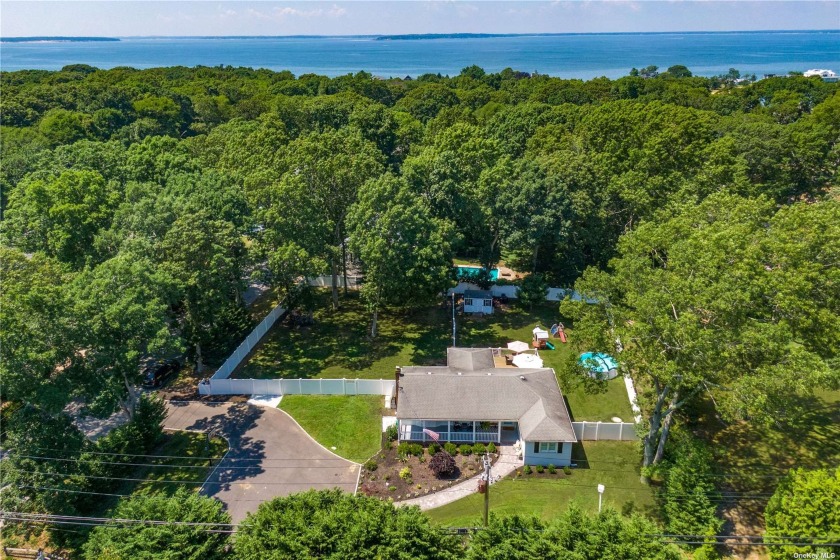Located in the desirable waterfront community of Bay View Oaks - Beach Home for sale in Southampton, New York on Beachhouse.com