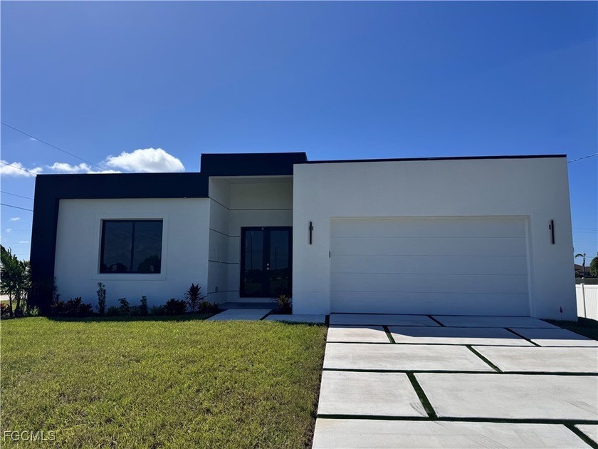 Discover this stunning, move-in-ready new construction home - Beach Home for sale in Cape Coral, Florida on Beachhouse.com