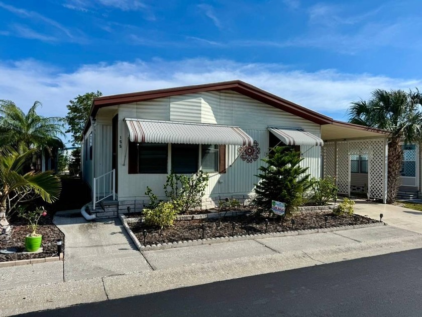 This home is located on leased land with a monthly lot rent of - Beach Home for sale in Clearwater, Florida on Beachhouse.com