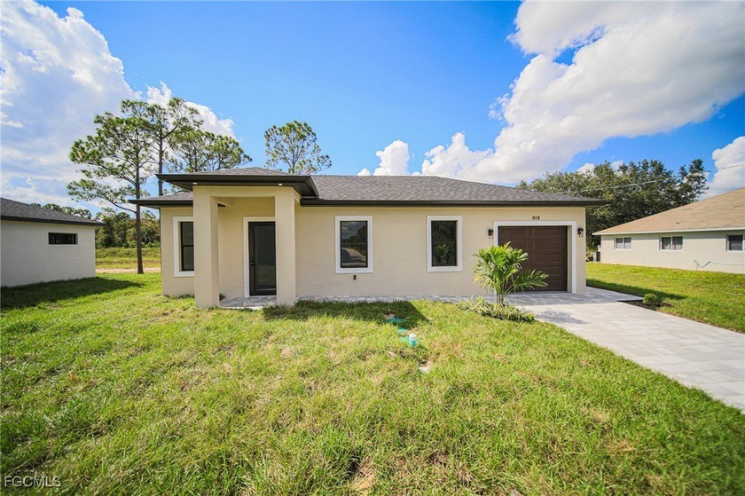 Brand-new construction - just completed! This beautifully - Beach Home for sale in Lehigh Acres, Florida on Beachhouse.com