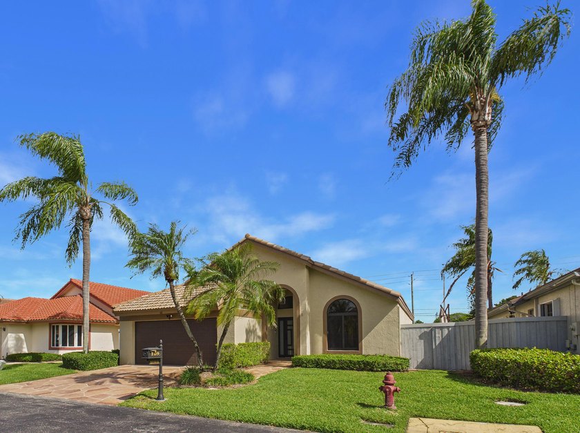 Your dream home awaits! This remarkable 3-bedroom, 2-bath split - Beach Home for sale in Boynton Beach, Florida on Beachhouse.com