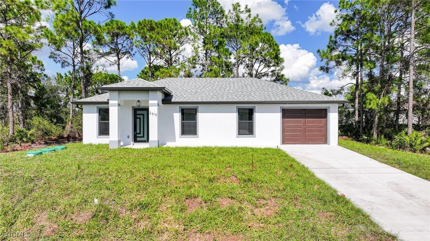Brand-new construction - just finished! This beautifully - Beach Home for sale in Lehigh Acres, Florida on Beachhouse.com