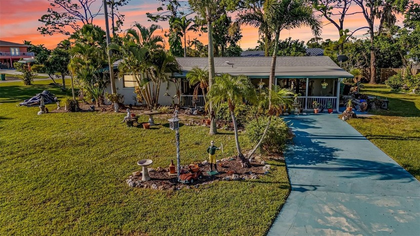 Welcome home to this charming 2-bedroom, 2-bath residence with a - Beach Home for sale in Englewood, Florida on Beachhouse.com