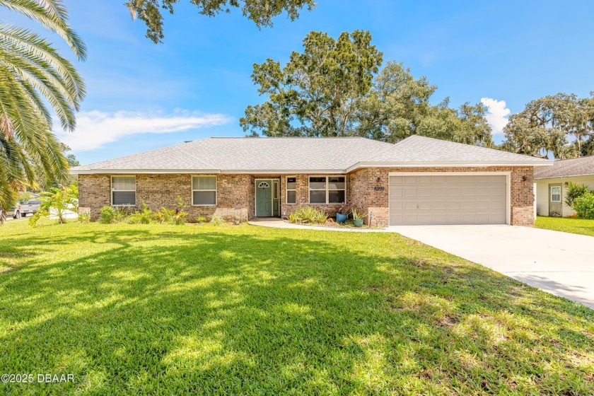 NO FLOODING - HIGH AND DRY! Discover this move-in-ready - Beach Home for sale in Port Orange, Florida on Beachhouse.com