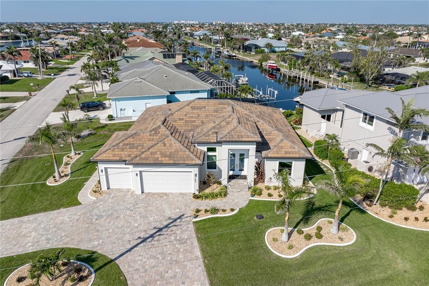SHOWCASE HOME W/A WATER VIEW IN PGI! Check out this exceptional - Beach Home for sale in Punta Gorda, Florida on Beachhouse.com