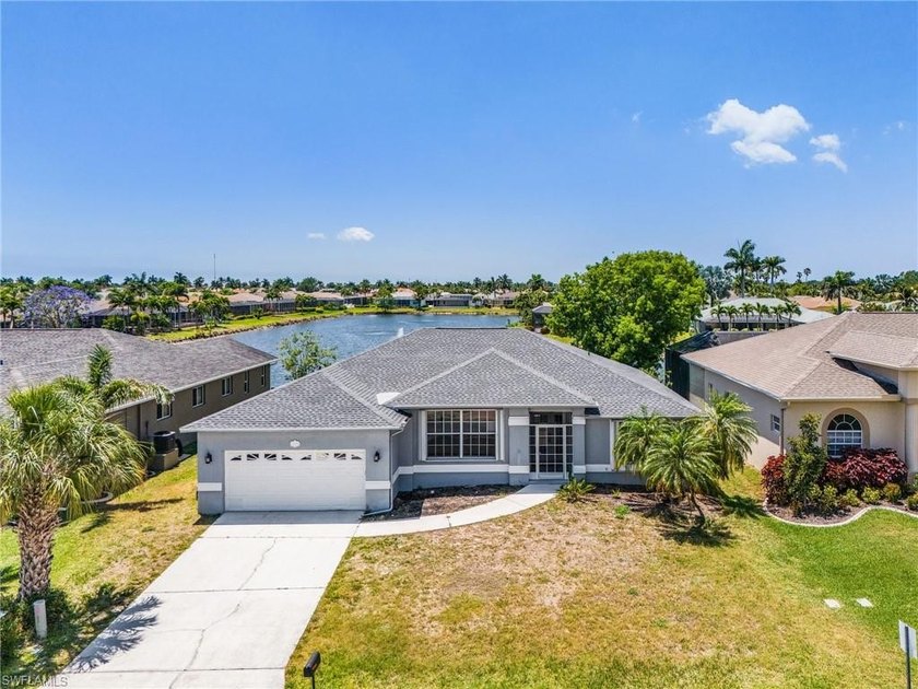 PRICED FAR BELOW MARKET VALUE, THIS POOL HOME POSITIONED WITH - Beach Home for sale in Fort Myers, Florida on Beachhouse.com