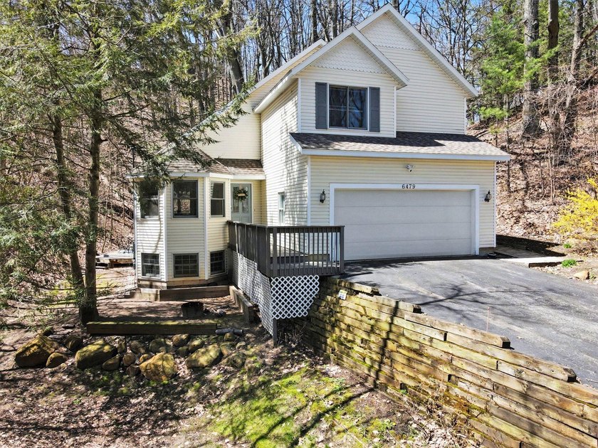 Nestled in the dunes with deeded Lake Michigan access, this - Beach Home for sale in West Olive, Michigan on Beachhouse.com
