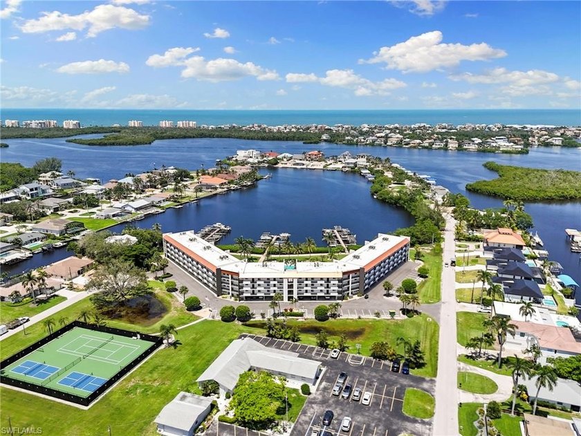 Welcome to Unit #303, a beautifully updated 2-bedroom condo that - Beach Condo for sale in Bonita Springs, Florida on Beachhouse.com