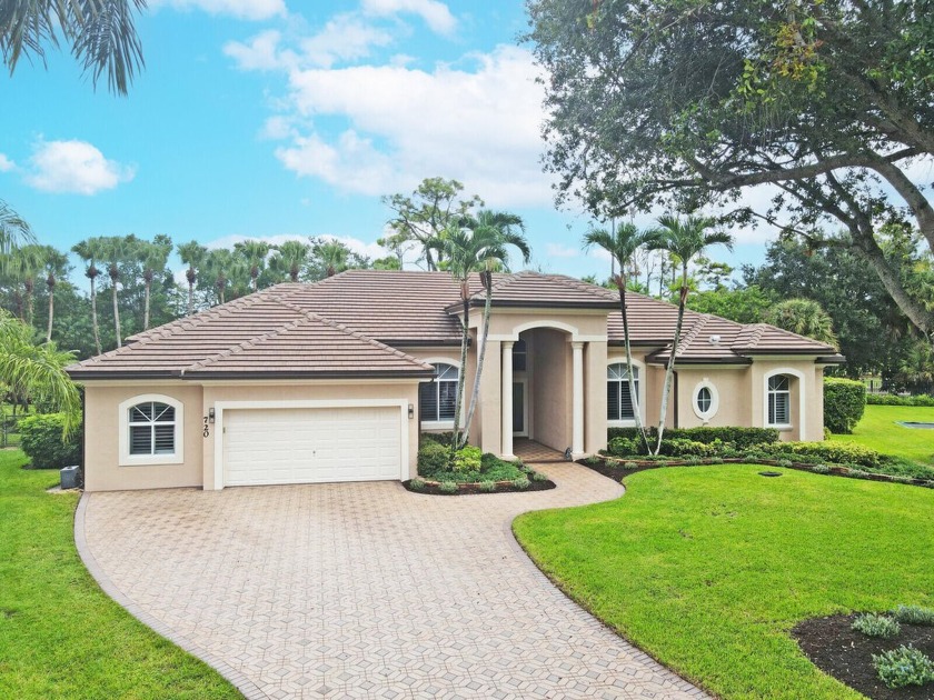 Welcome to your dream home in prestigious Binks Estates! This - Beach Home for sale in Wellington, Florida on Beachhouse.com