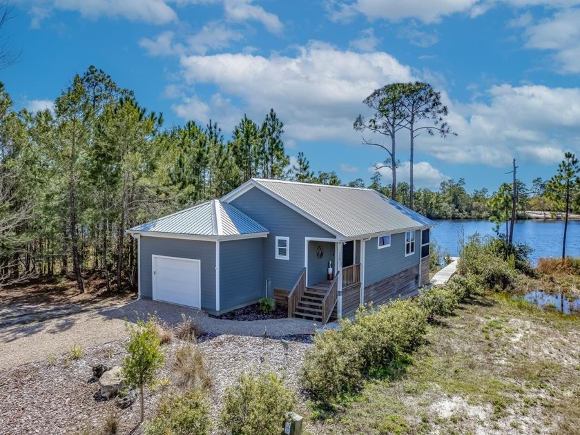 Beautiful, like new furnished, lake front cottage in private - Beach Home for sale in Carabelle, Florida on Beachhouse.com