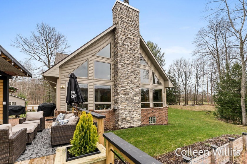 Discover the perfect blend of natural beauty and refined comfort - Beach Home for sale in Free Soil, Michigan on Beachhouse.com