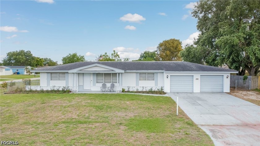 Charming 3-bedroom, 2-bath home on a spacious corner lot in the - Beach Home for sale in Lehigh Acres, Florida on Beachhouse.com