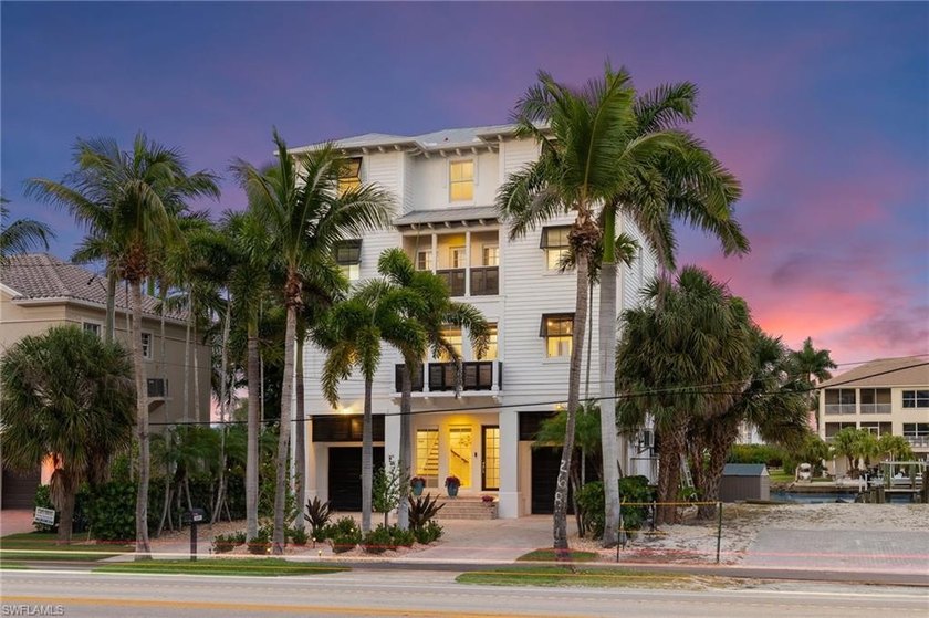 STUNNING WATERFRONT BEACH HOUSE WITH PRIVATE BOAT DOCK, SWEEPING - Beach Home for sale in Bonita Springs, Florida on Beachhouse.com