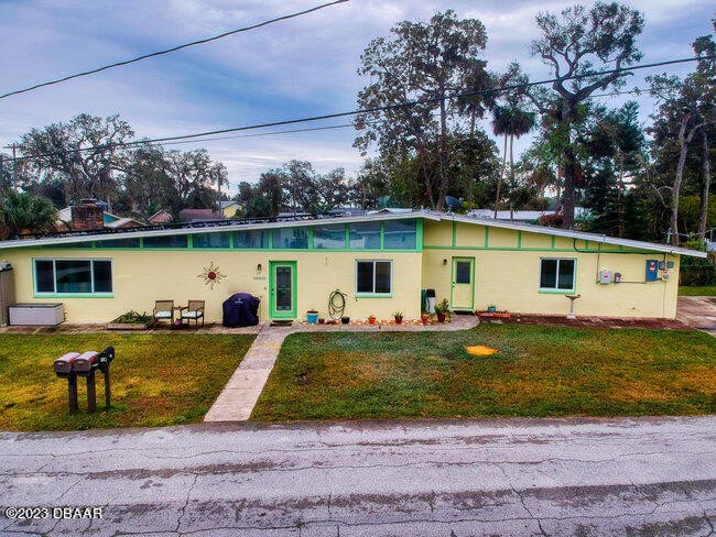 Welcome to your dream mid-century modern retreat in the heart of - Beach Home for sale in Port Orange, Florida on Beachhouse.com