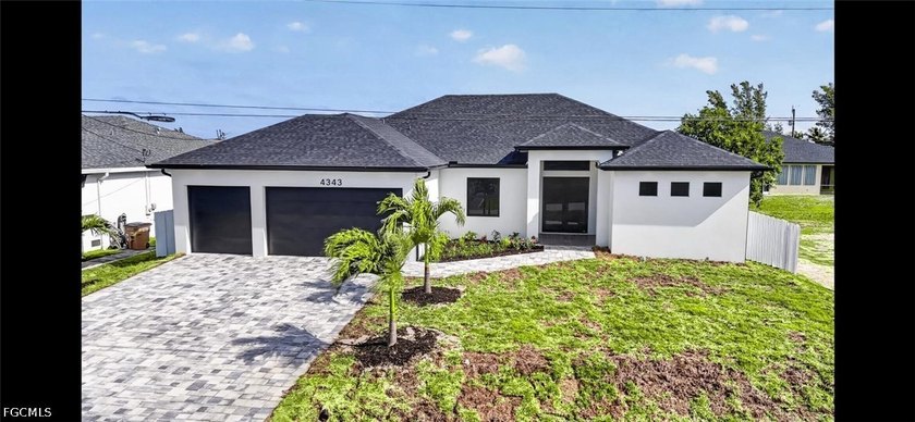 This stunning new construction residence offers the perfect - Beach Home for sale in Cape Coral, Florida on Beachhouse.com