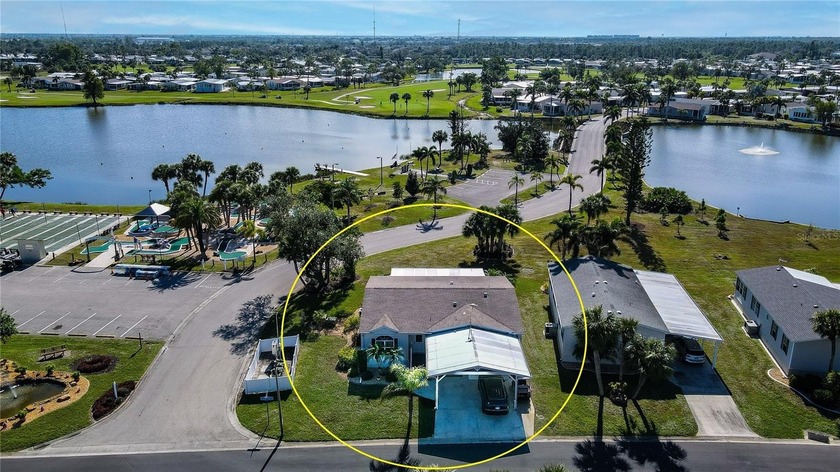 This amazing TRIPLE-wide Palm Harbor home is situated on a - Beach Home for sale in Port Charlotte, Florida on Beachhouse.com